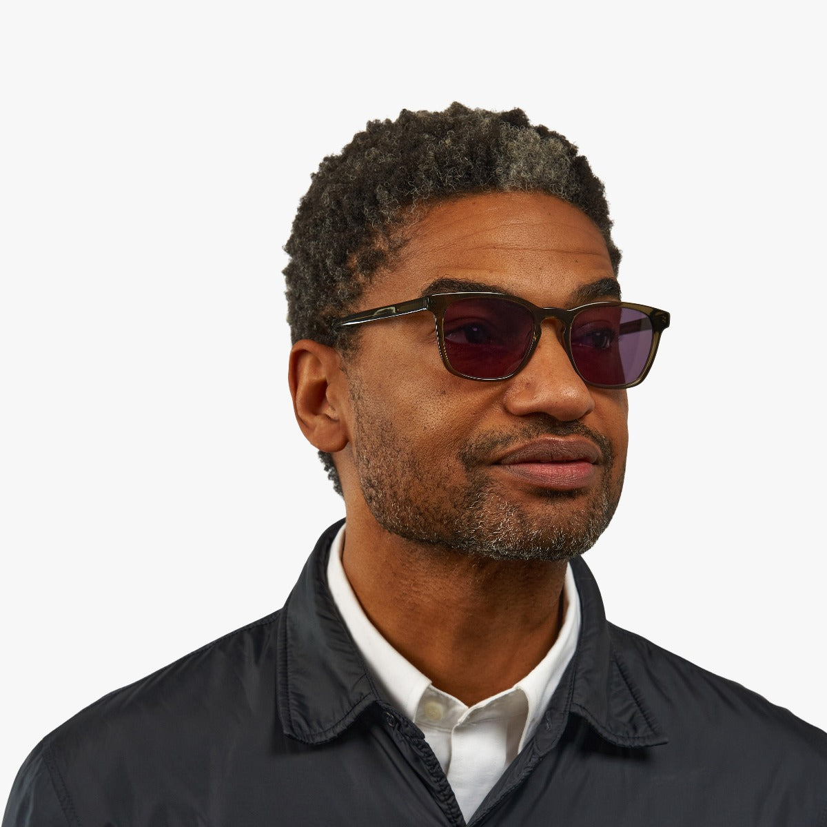 Person wearing Bornholm Shiny Olive sunglasses