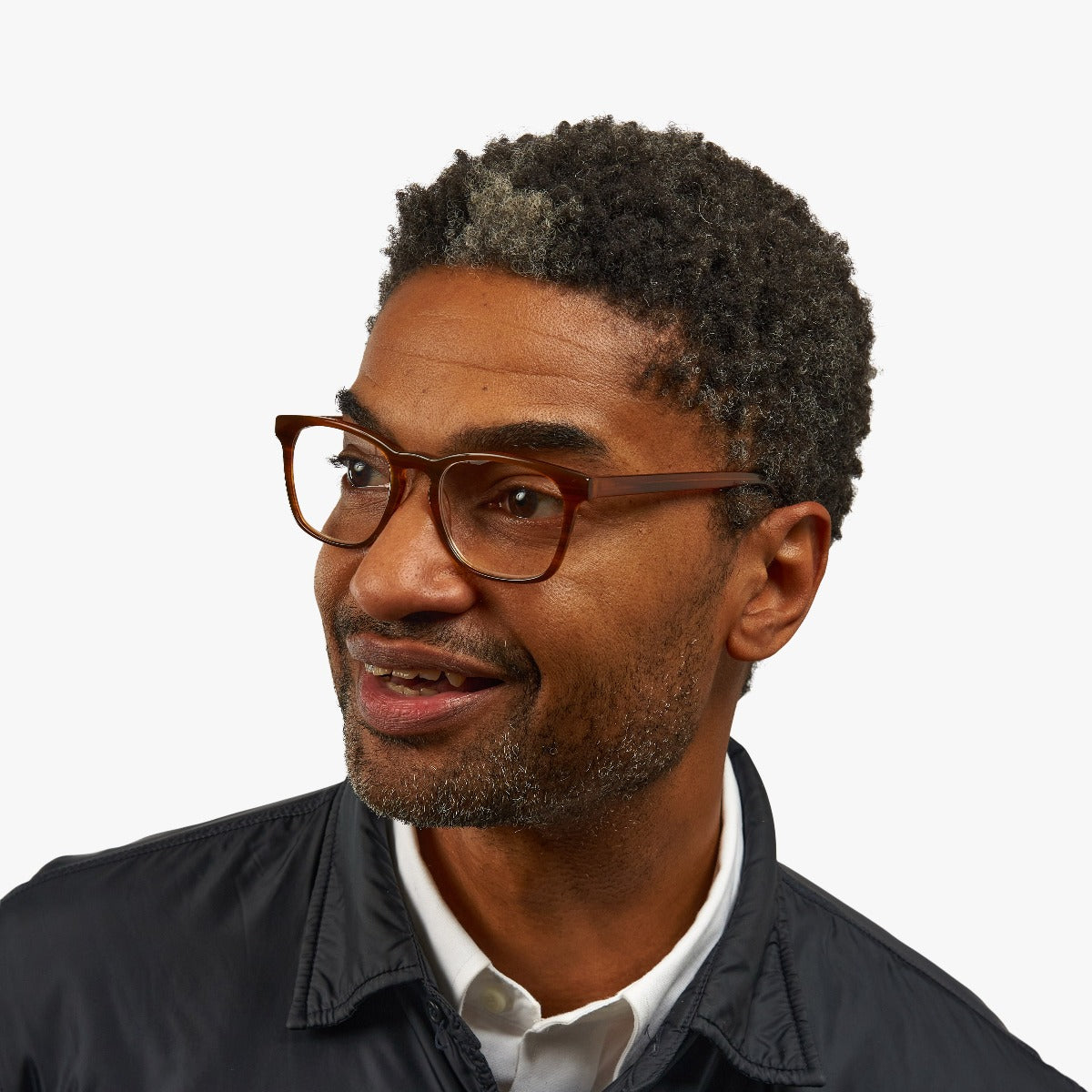 Person wearing Bornholm Shiny Walnut eyeglasses