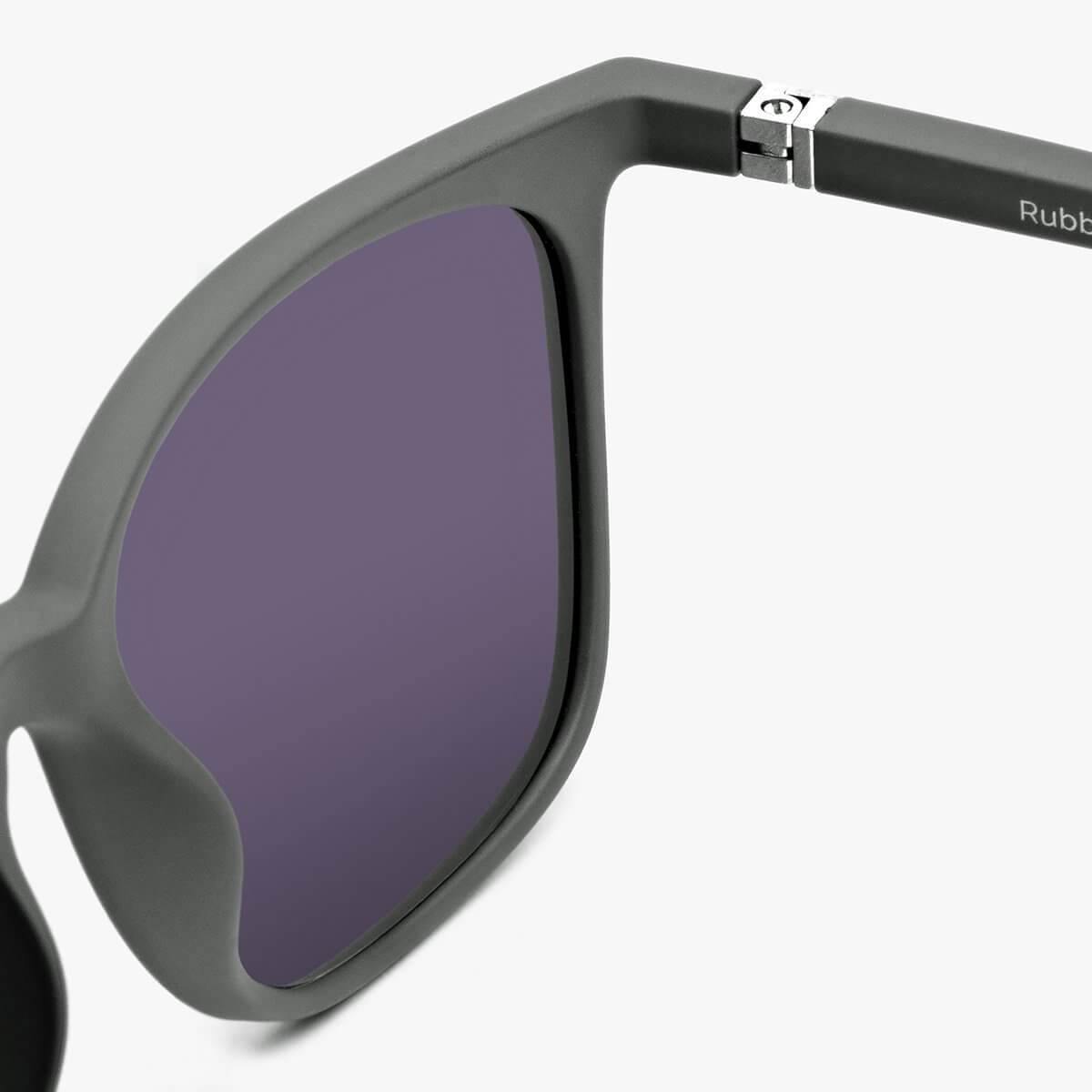 Close-up of Fyn Dark Army glasses with gray frame and dark lenses