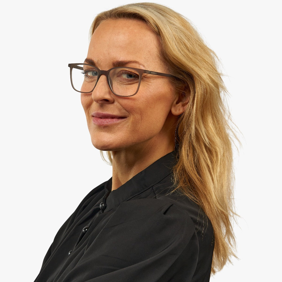 Person wearing Fyn Grey reading glasses