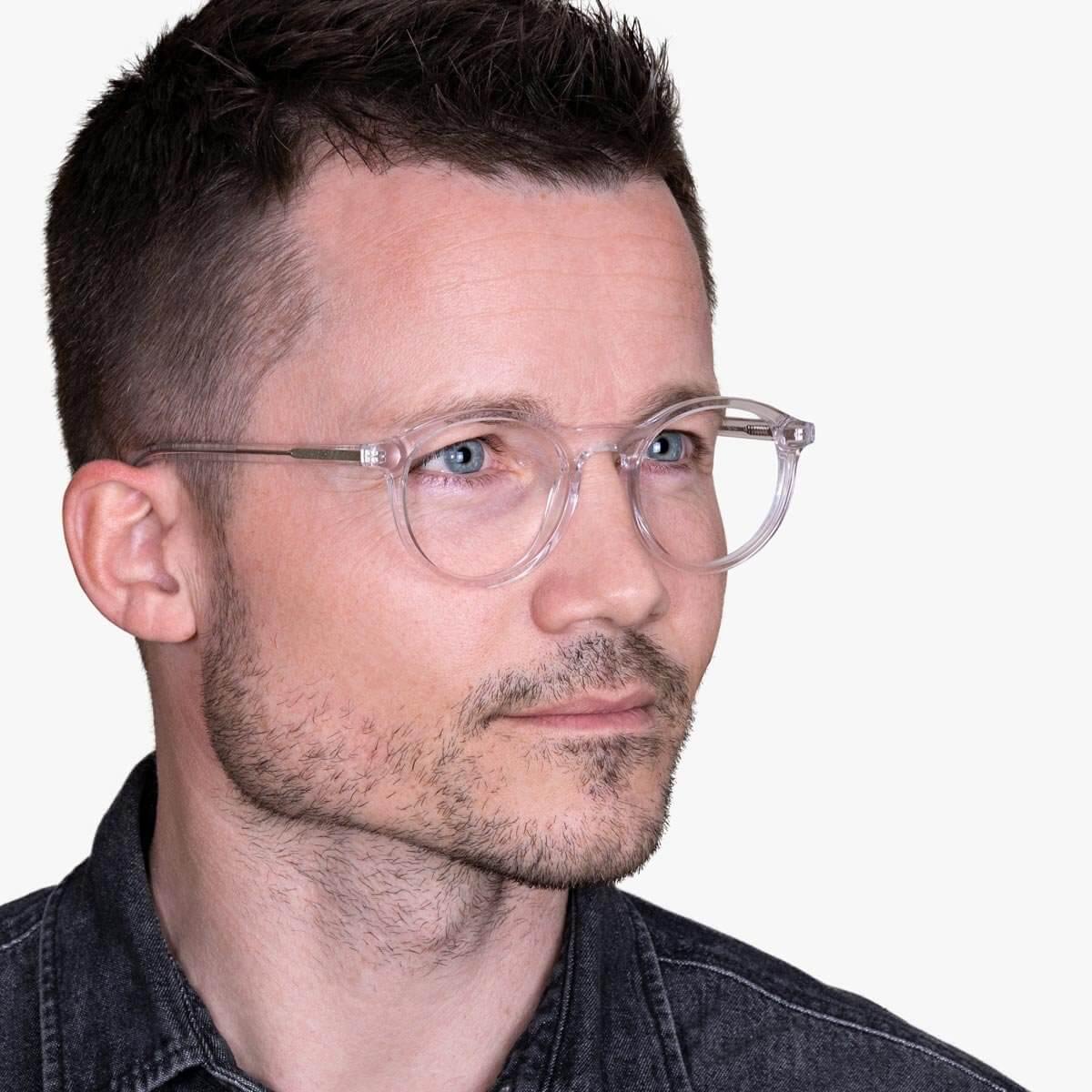 Person wearing Løkken Crystal White glasses