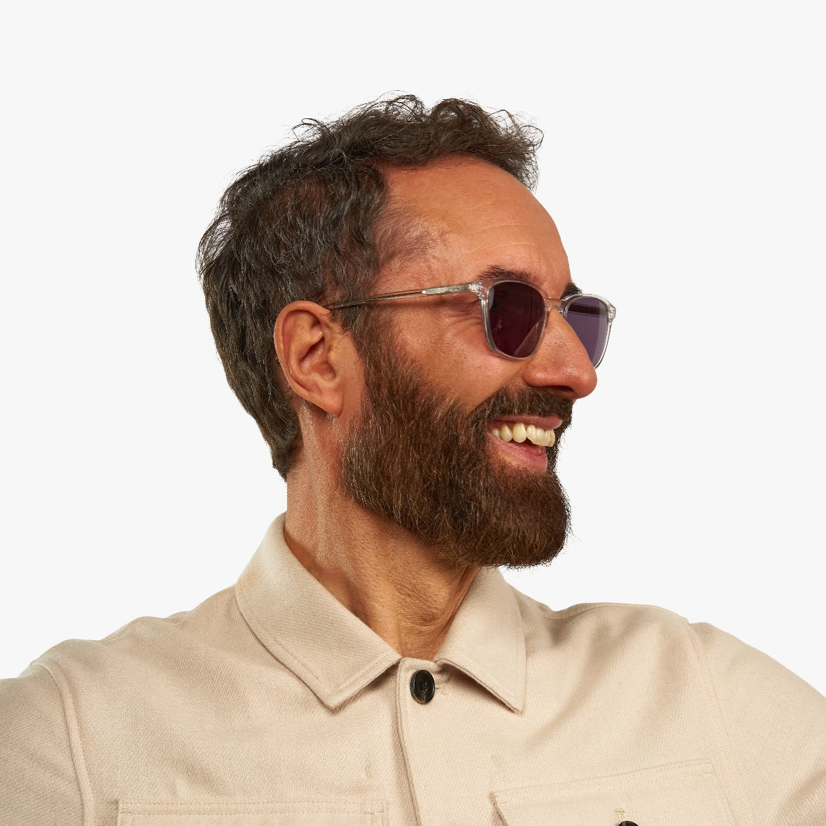 mens-ebeltoft-crystal-white_sunglasses_male-model-1.jpg?v=1771423769&width=1200