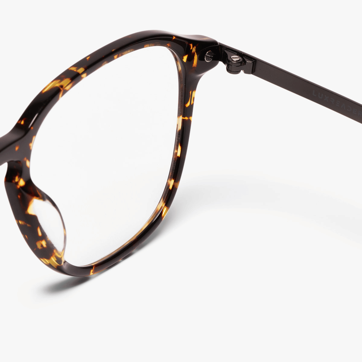 Rønne Dark Turtle round tortoiseshell glasses with Luxreaders logo on temple