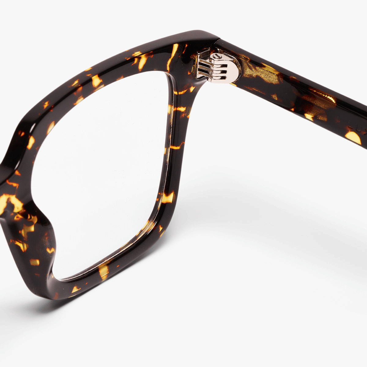 Tortoise shell square glasses frame close-up