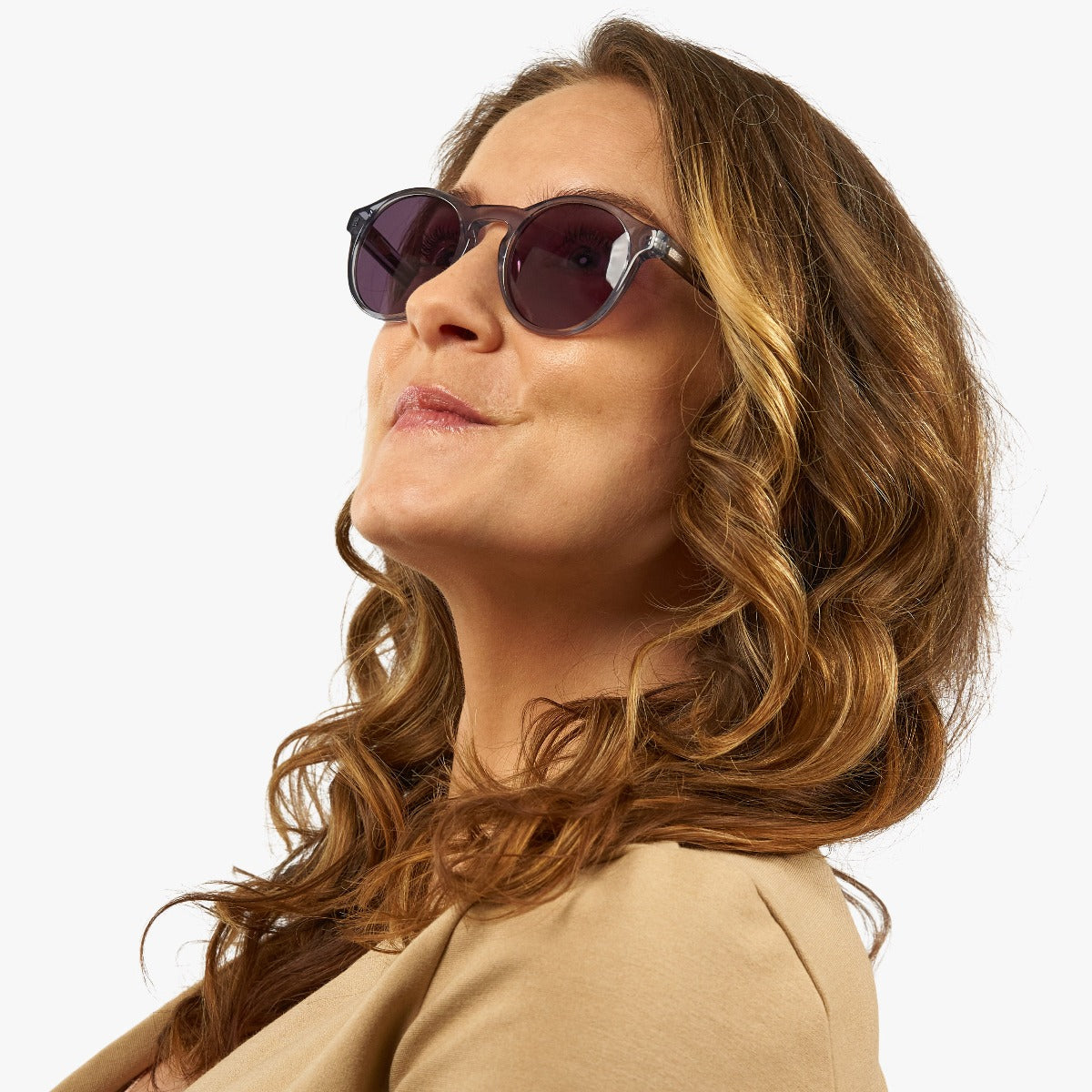 Person wearing Trondheim Crystal Grey sunglasses