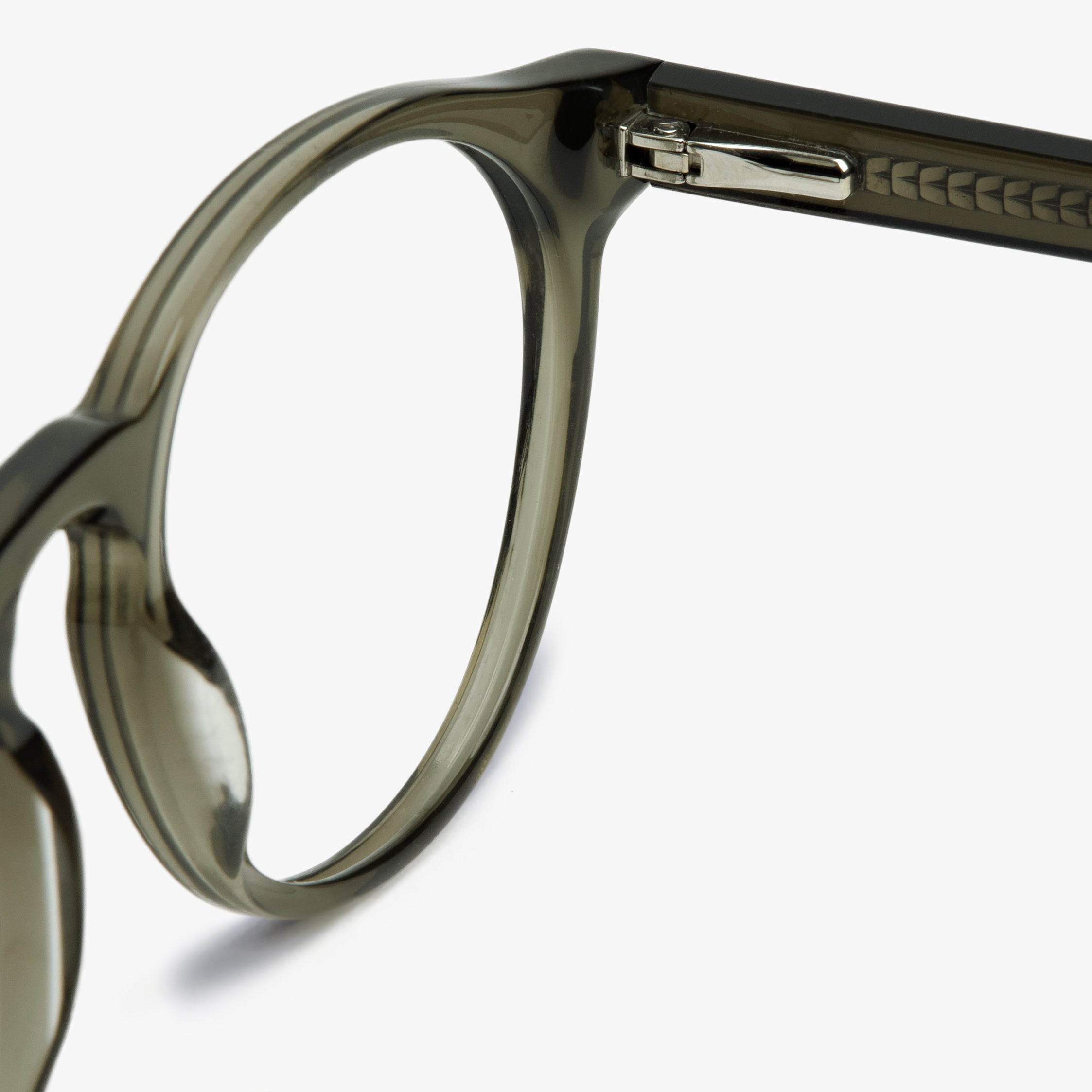 Trondheim Shiny Olive glasses in translucent green with subtle detailing