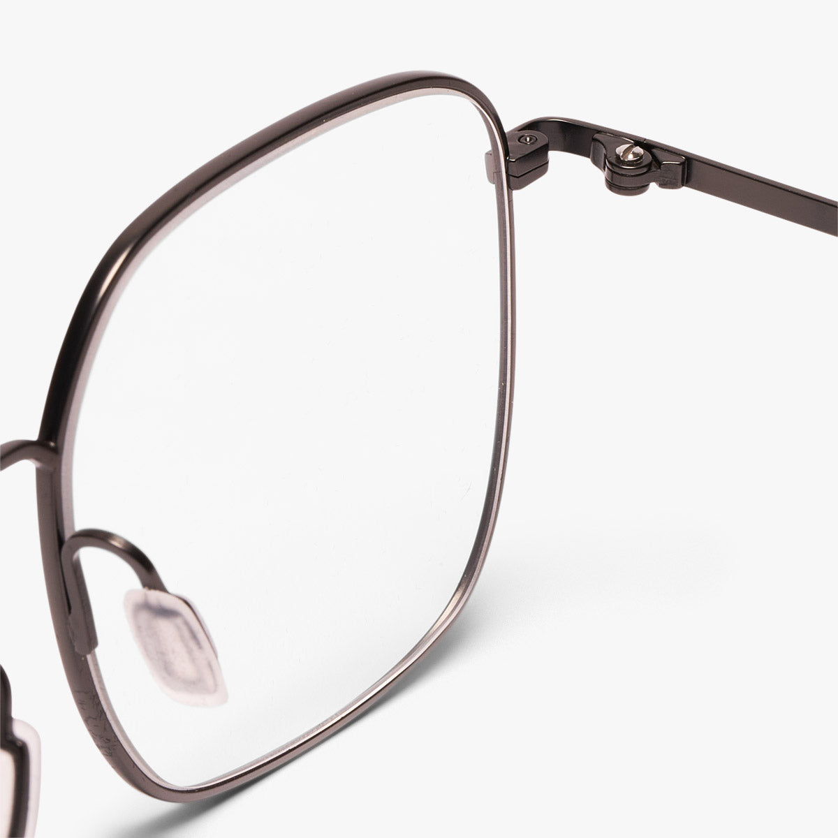 Close-up of Båstad Gun eyeglass frame with metal detail