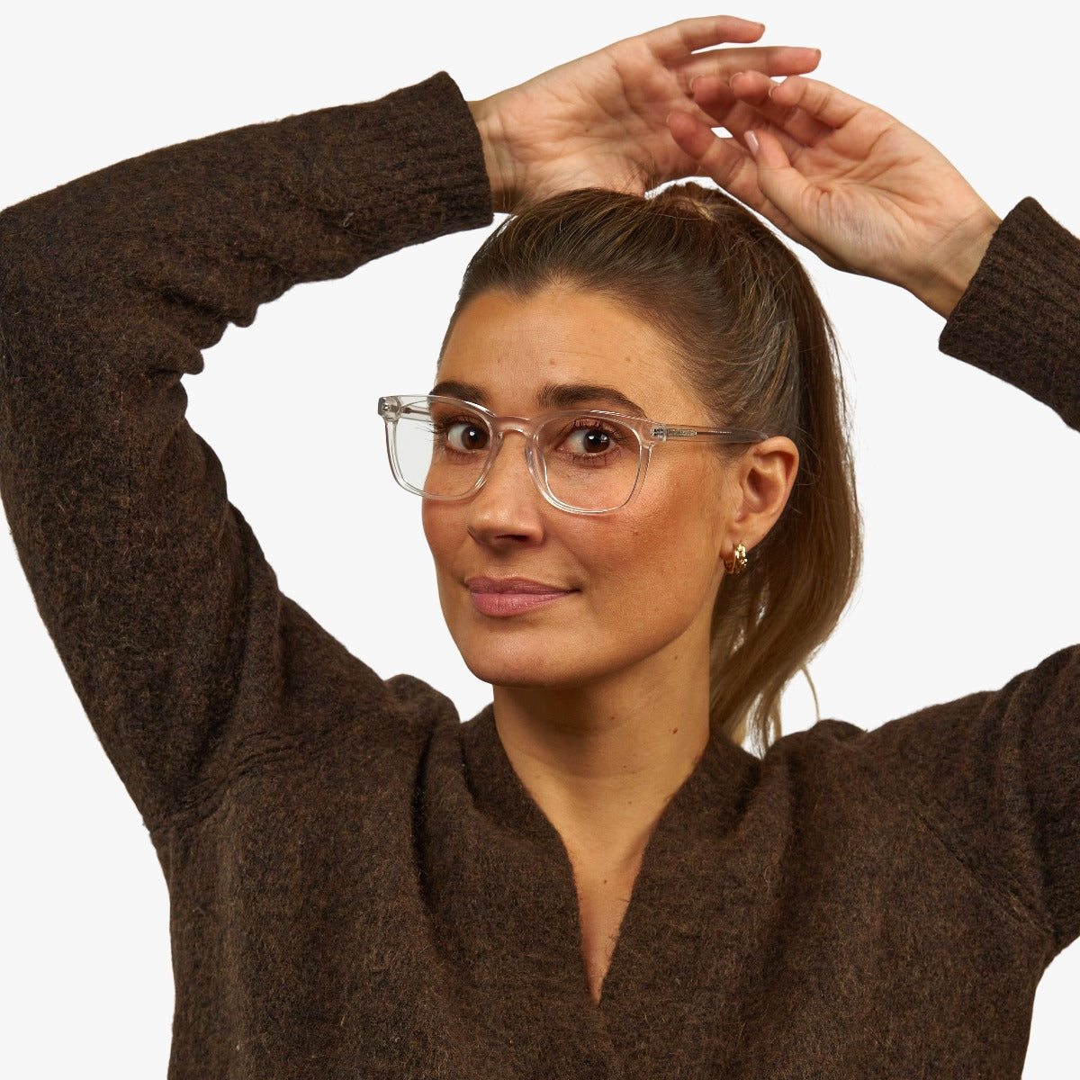 Person wearing crystal white glasses