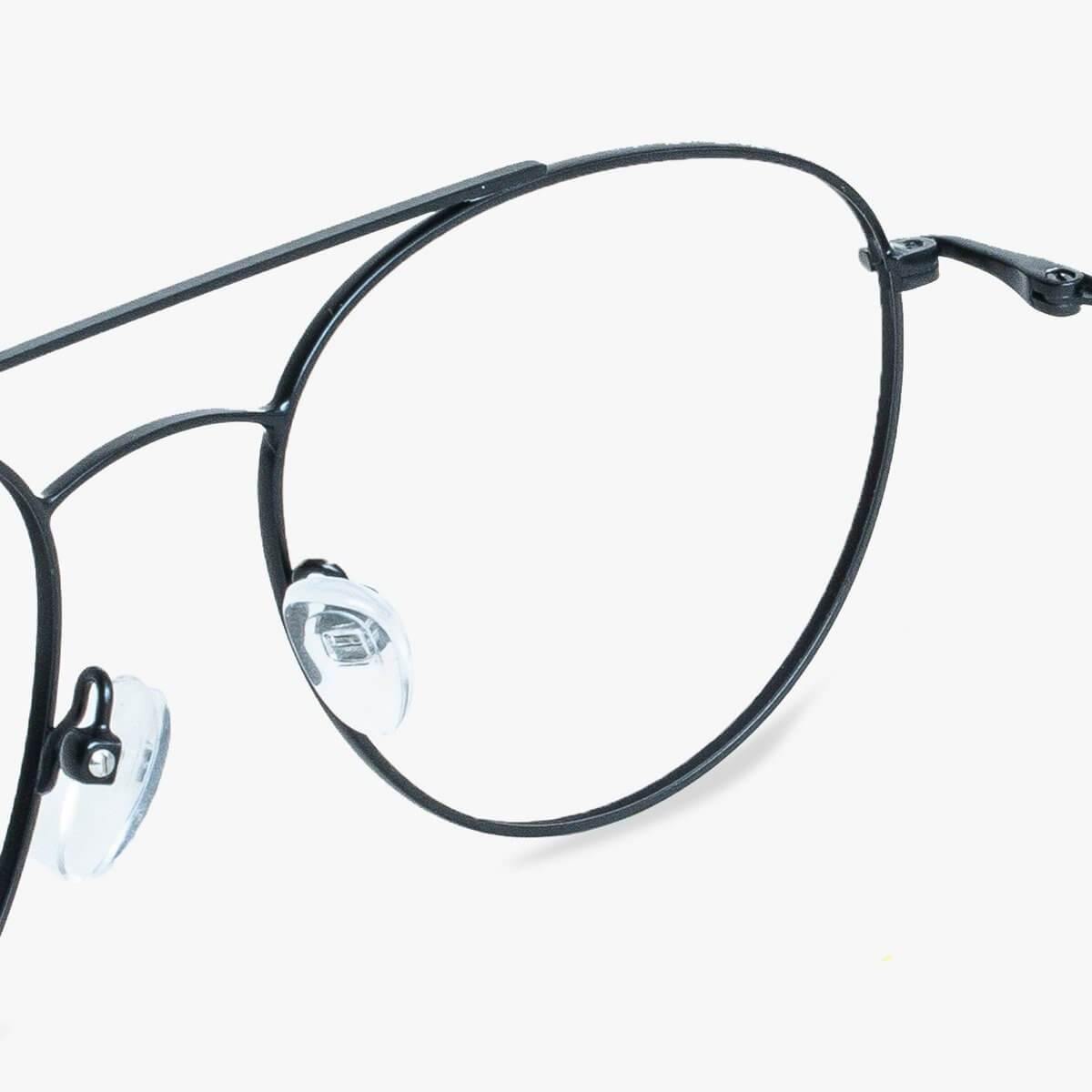 Close-up of black thin metal frame women's Göteborg glasses