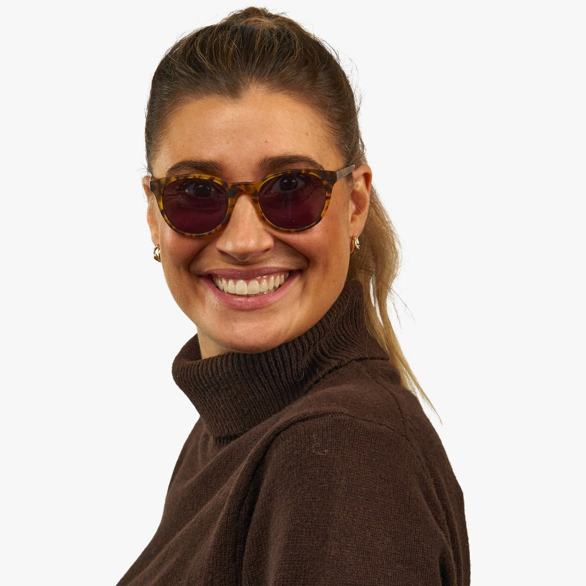 womens-stockholm-turtle_sunglasses_female-model-1.jpg?v=1771419748&width=1200