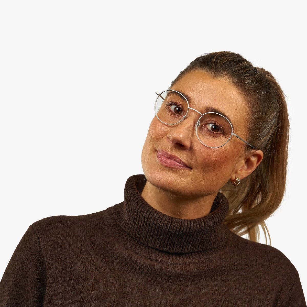 womens-tromso-steel_blue-light-glasses_female-model-1.jpg?v=1771418309&width=1200
