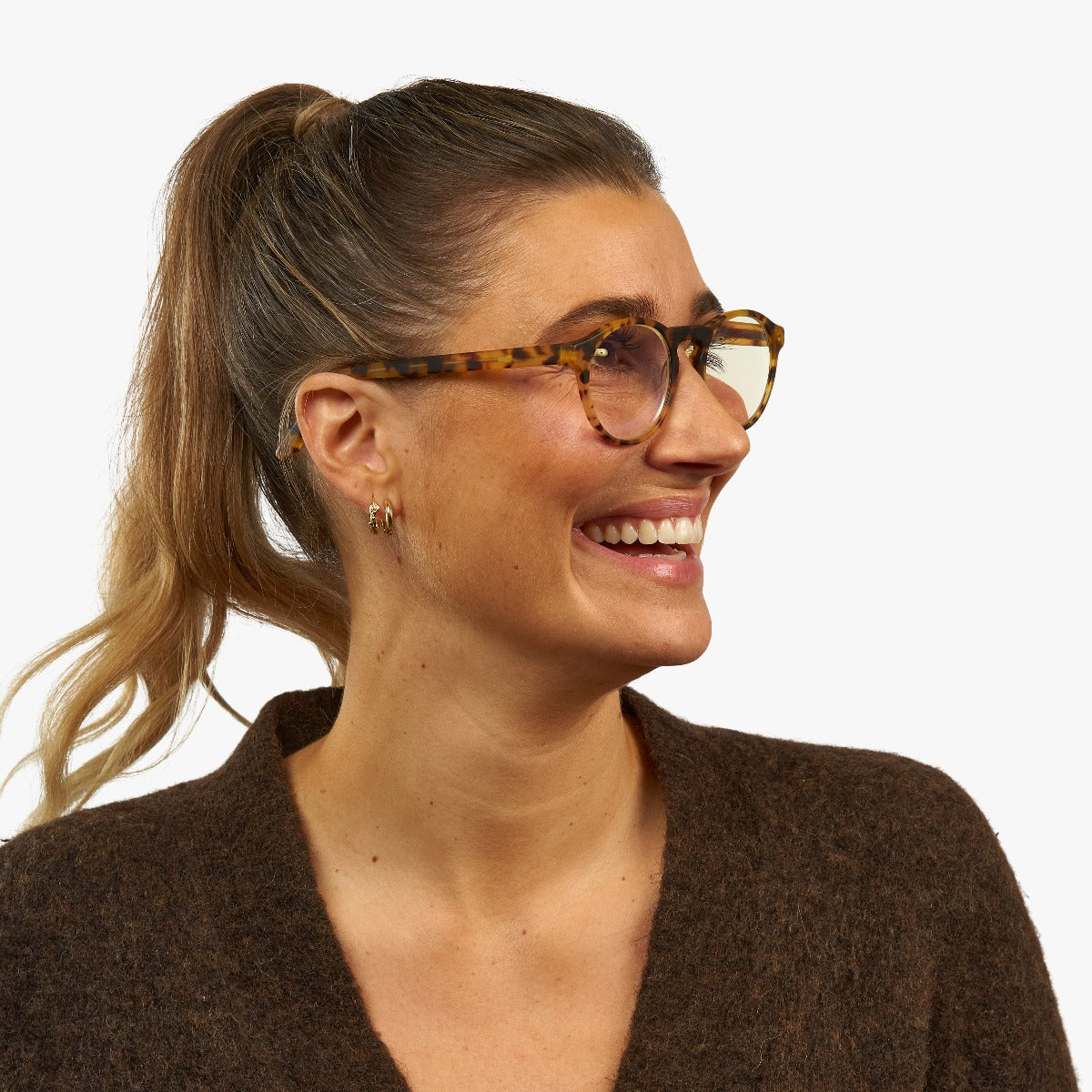 Person wearing Women's Trondheim Light Turtle glasses