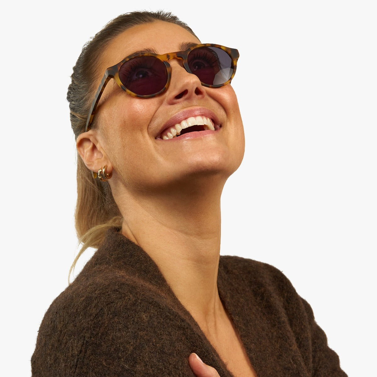 womens-trondheim-light-turtle_sunglasses_female-model-1.jpg?v=1771417834&width=1200